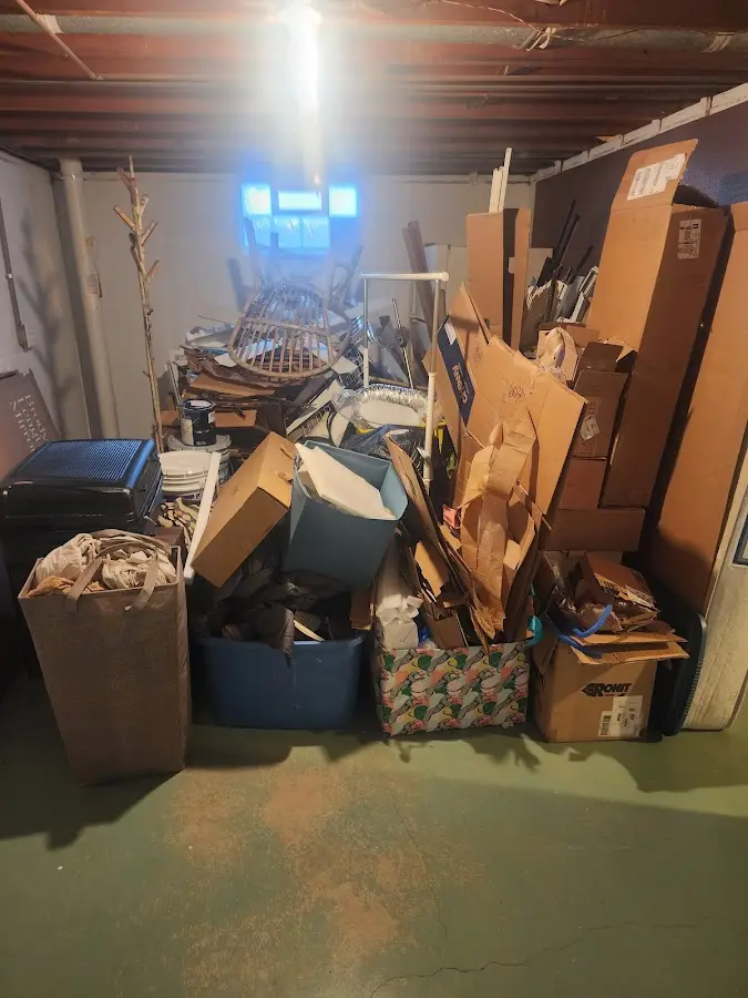 Roll-off dumpster container at job site for 4 Yard Dumpster Rental in Le Mars